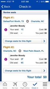 The upgrade is now confirmed and the new seat assignment appears in the reservation.