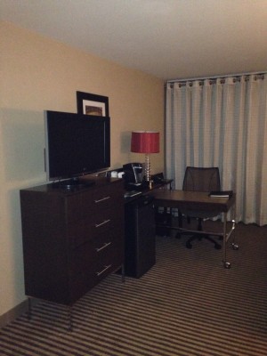 Desk area, TV, and dresser at the Hyatt Regency DFW, "suite" 923.