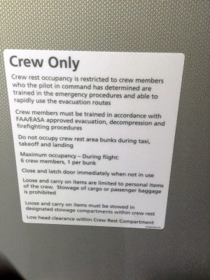 If you see your flight attendants heading back to the galley mid-flight, they may be headed to a back door instead... the crew rest area.